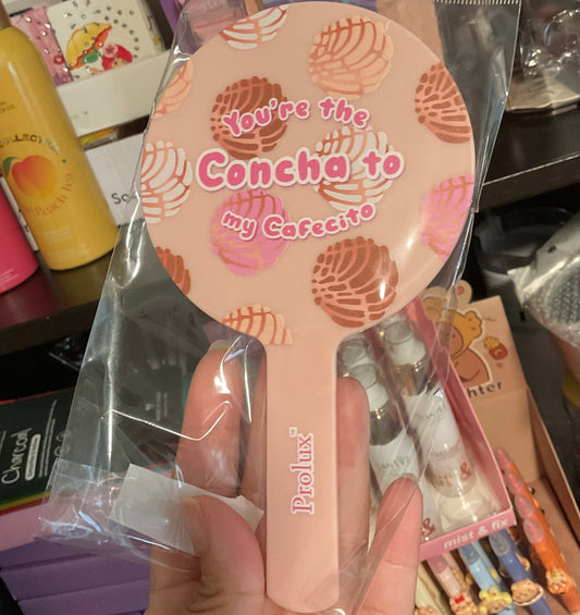Concha hand mirror